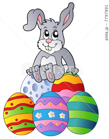 Bunny on pile of Easter eggs Bunny on pile of Easter eggs 7797891