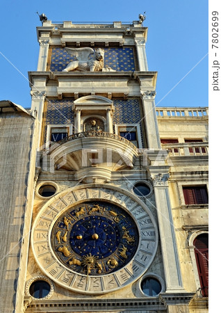 Clock on the wall of the house at St. Mark's Square. 7802699