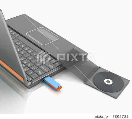 CD lies next to a notebook in which the inserted flash drive 7802781