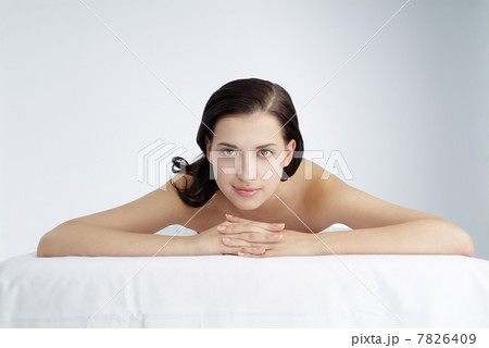 Young woman lying on front 7826409