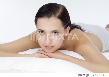 "Young woman lying on front,close up" 7826640
