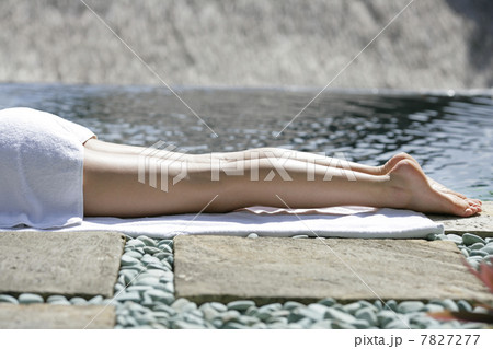 Woman enjoying sunbathing Woman enjoying sunbathing 7827277