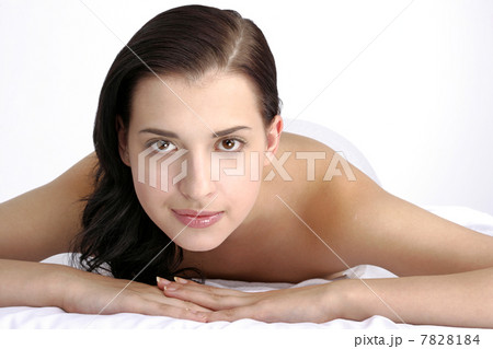 "Young woman lying on front,close up" "Young woman lying on front,close up" 7828184