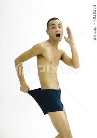 Side view of young man only wearing underwear Side view of young man only wearing underwear 7828233