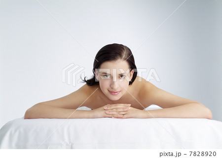 Young woman lying on front 7828920