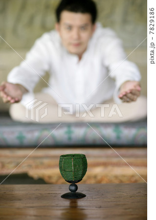 Young man practising yoga Young man practising yoga 7829186