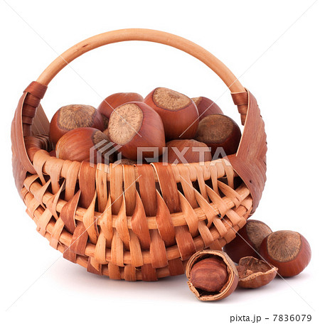 Hazelnuts in wicker basket Hazelnuts in wicker basket 7836079