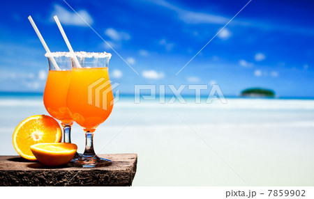 Tequila Sunrise Cocktail on wooden planks 7859902