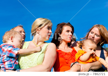 Family and multi-generation - fun on meadow in summer 7862721