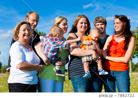 Family and multi-generation - fun on meadow in summer 7862722