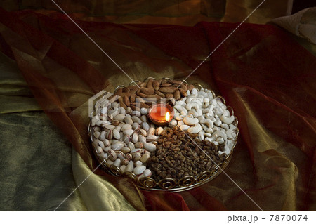 Different nuts and diya  7870074