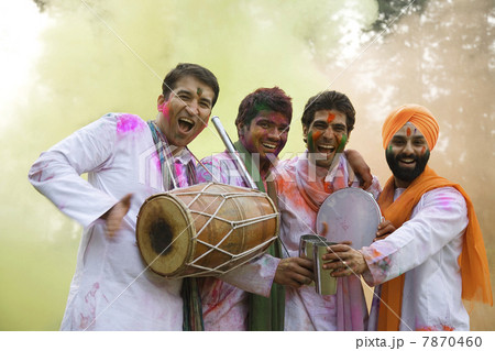 Men celebrating Holi  7870460