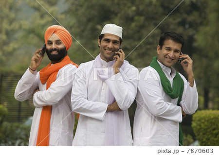 Men talking on mobile phones Men talking on mobile phones 7870603