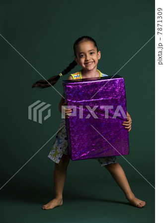 A girl holding a gift A girl holding a gift 7871309
