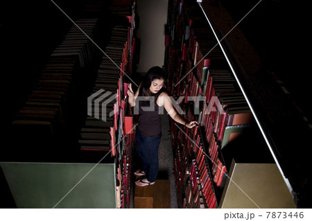 College student in the library  7873446