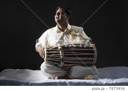 Man playing the tabla Man playing the tabla 7873956