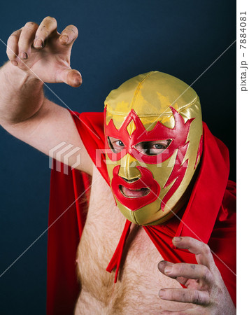 Mexican wrestler in a fight pose 7884081
