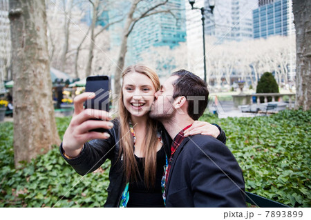 Young couple taking a picture of themselves 7893899