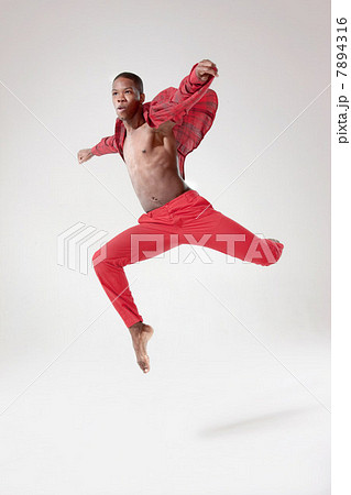 Young dancer in mid air 7894316