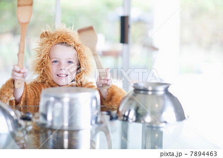 Boy pretending to be drummer 7894463