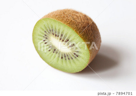 Half a kiwi on white background Half a kiwi on white background 7894701
