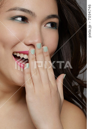 Young woman laughing in studio Young woman laughing in studio 7894746