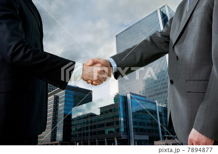 Businessmen shaking hands 7894877