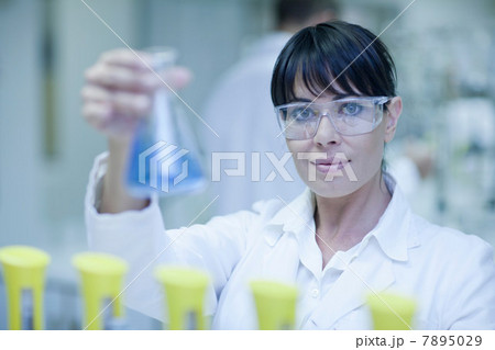 Oenologist checking laboratory tests 7895029