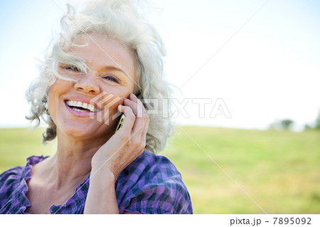 Mature woman on cell phone, portrait Mature woman on cell phone, portrait 7895092