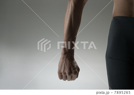 Man with clenched fist, mid section 7895265