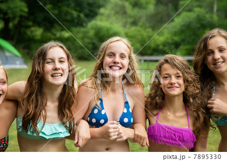 Portrait of girls wearing bikini tops Portrait of girls wearing bikini tops 7895330
