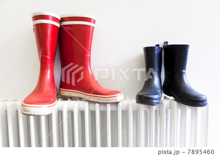 Wellington boots on radiator Wellington boots on radiator 7895460
