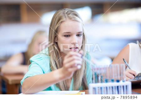 School girls enjoying science lesson 7895894