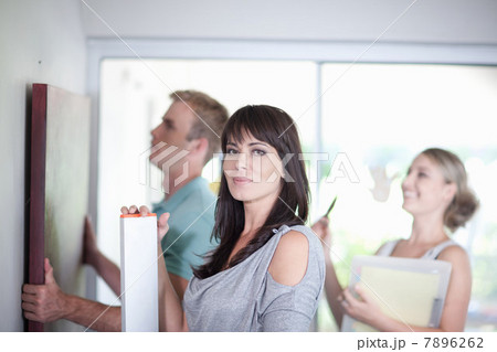 Couple working with interior designer 7896262