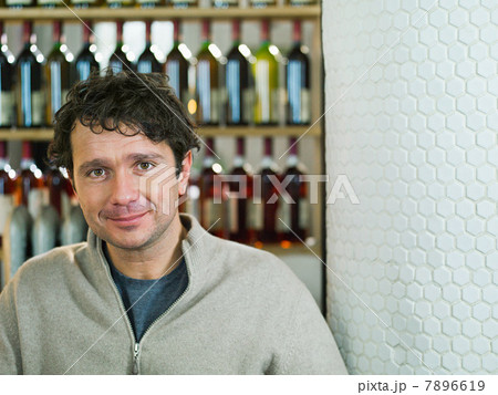 Portrait of mid adult man in cafe looking at camera Portrait of mid adult man in cafe looking at camera 7896619
