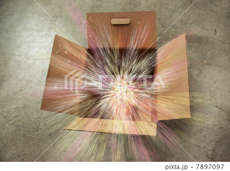 Open cardboard box with sparks Open cardboard box with sparks 7897097