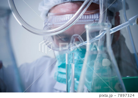 Scientist using pipette, close up 7897324
