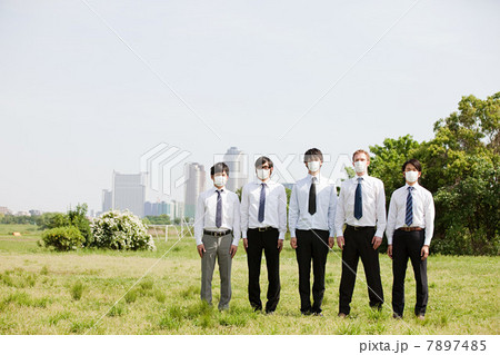 Businessmen in a row wearing pollution masks 7897485