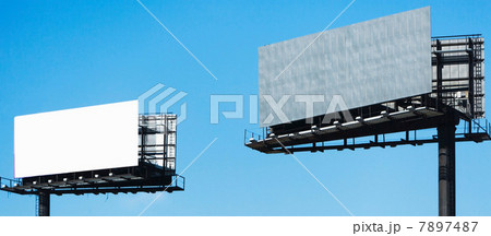 Blank billboards against blue sky 7897487