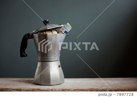 Coffee pot with Euros inside Coffee pot with Euros inside 7897728