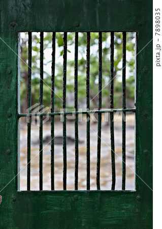 View through prison cell window at Con Dao Island, Vietnam 7898035