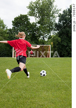 Girls playing soccer 7898147