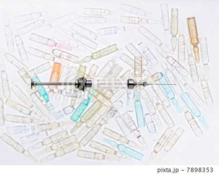 Close up of syringe and vials Close up of syringe and vials 7898353