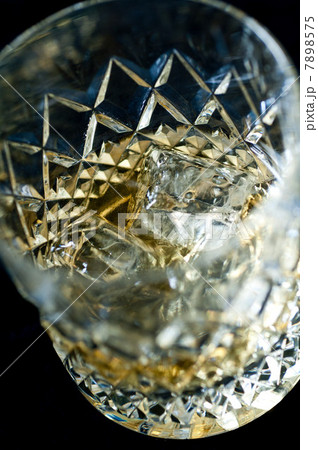 Whiskey on the rocks in a tumbler Whiskey on the rocks in a tumbler 7898575