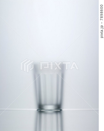 Blurred view of water glass Blurred view of water glass 7898600
