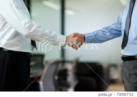 Businessmen shaking hands Businessmen shaking hands 7898752