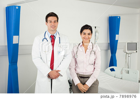 Portrait of male and female doctors Portrait of male and female doctors 7898976