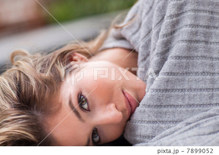 Portrait of woman wrapped in blanket Portrait of woman wrapped in blanket 7899052