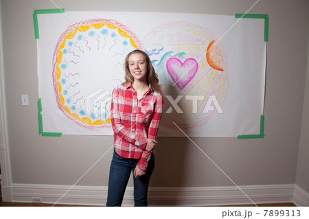 Girl standing in front of mural Girl standing in front of mural 7899313