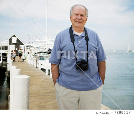 Portrait of senior man on vacation 7899517